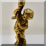 D37. Brass cherub figurine. 